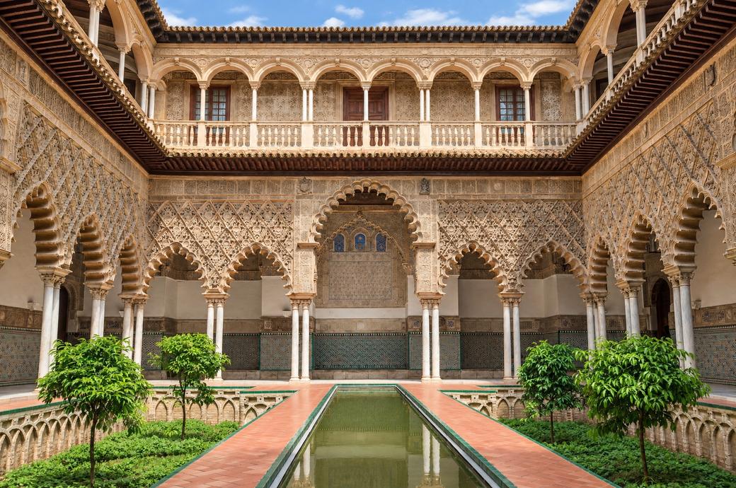 Mudéjar arches and pool of the Courtyard of the Maidens, Real Alcázar