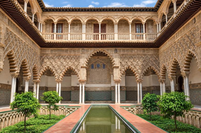 Mudéjar arches and pool of the Courtyard of the Maidens, Real Alcázar